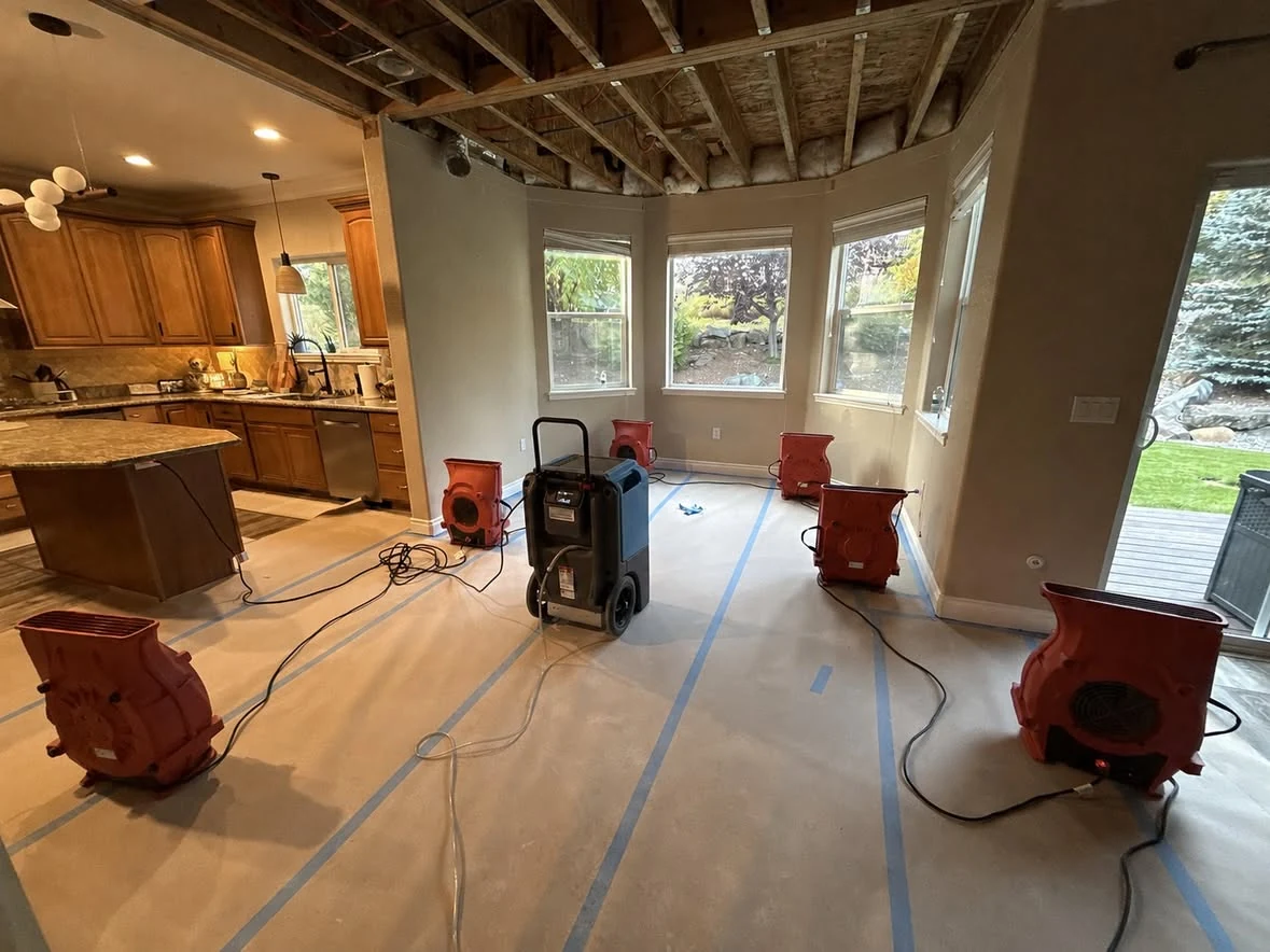 Water mitigation drying equipment operating inside a residential kitchen